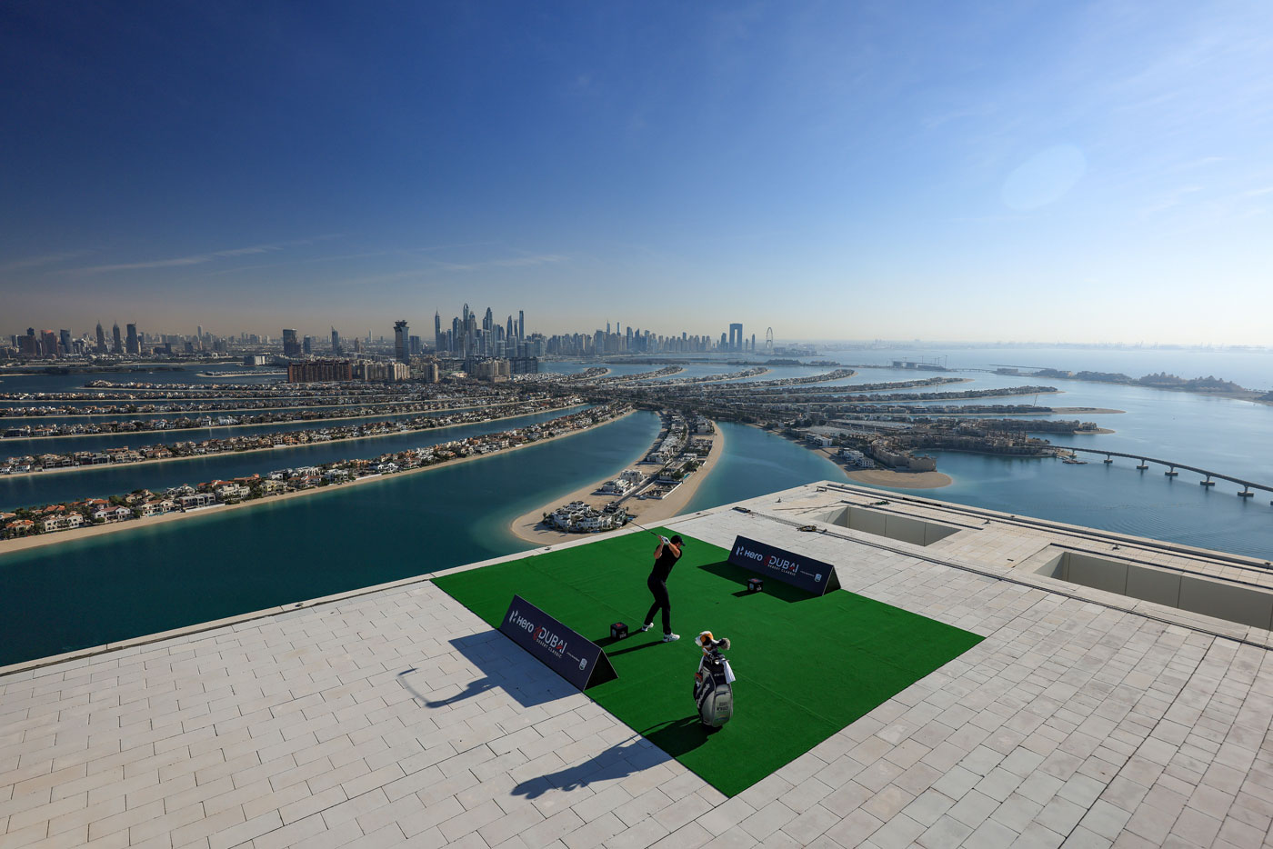 Rory McIlroy drives a historic shot from iconic Atlantis The Royal, Dubai ahead of Hero Dubai Desert Classic